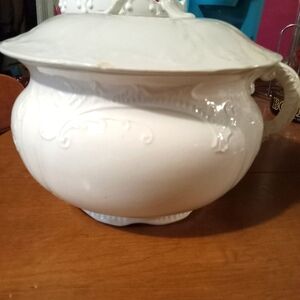 Antique ironstone chamber pot with lid